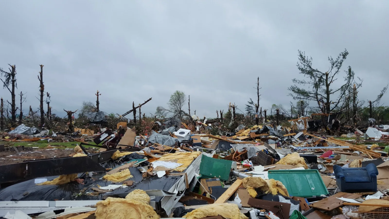 Commercial building and roof damage after a tornado